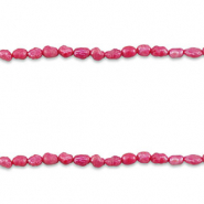 Perles d'eau douce "grain de riz" Rose