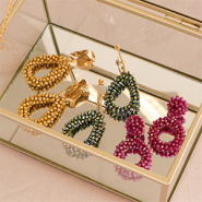 Nouveau Regardez toute la collection de boucles d’oreilles et pendentifs facettés