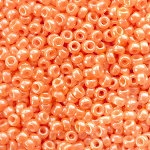 Perles de rocailles Miyuki 11/0 Opaque luster light orange 11-423